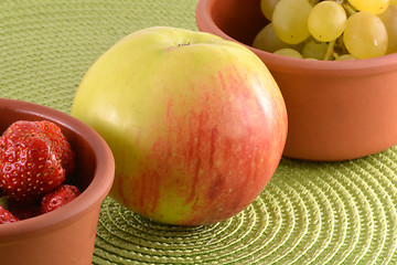 Image showing fresh fruits. strawberry, apple, grape