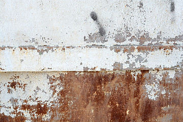 Image showing scratched ripped metal plating, grunge background