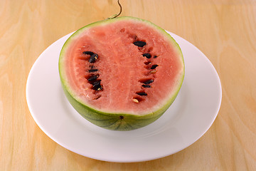 Image showing fresh watermelon fruit on wooden background