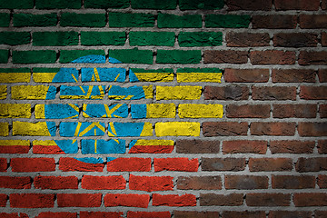 Image showing Brick wall texture with flag