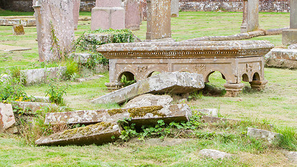 Image showing Very old broken gravestone in the cemetery