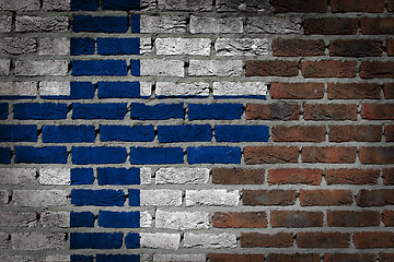 Image showing Brick wall texture with flag