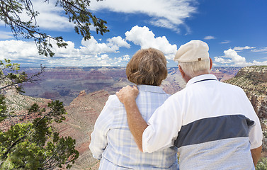 Image showing Happy Senior Couple Looking Out Over The Grand Canyon