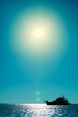 Image showing Modern luxurious yacht silhouette in the tropical sea. Thailand