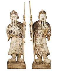 Image showing Two statues of ancient Chinese warriors isolated on white backgr