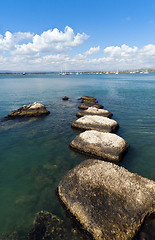 Image showing Breakwaters and blue sea 