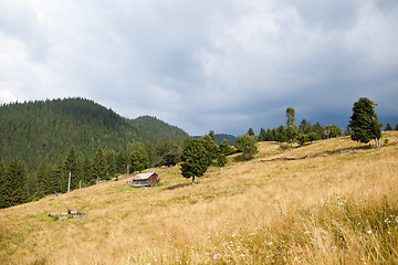 Image showing Cloudy stormy sky above mountain