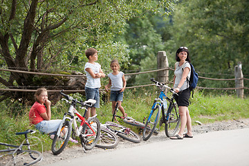 Image showing Family with bicycles