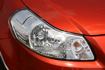 Image showing Front headlight of new car