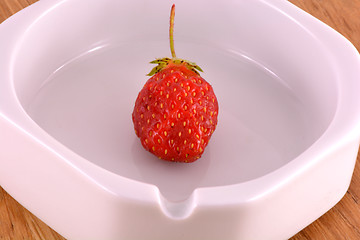 Image showing Fresh ripe strawberries on a vintage wooden background