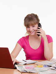 Image showing Girl talking on the phone with employer