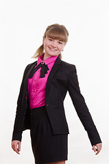Image showing Portrait of young slim girl in a suit