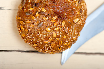 Image showing organic bread over rustic table