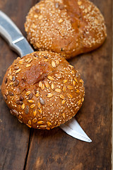 Image showing organic bread over rustic table