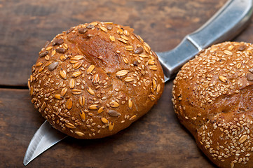 Image showing organic bread over rustic table