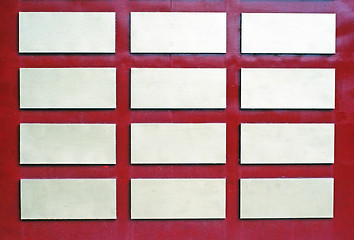 Image showing Wall burgundy with white inserts rectangel as background