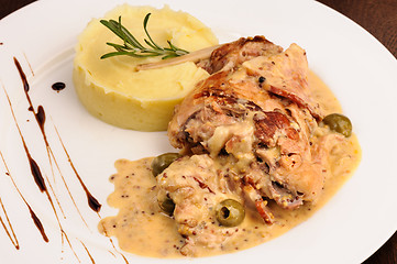 Image showing Rabbit legs with potato puree and rosemary