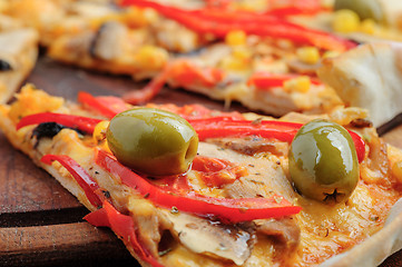 Image showing Pizza with Mozzarella, Mushrooms, Olives and Tomato Sauce