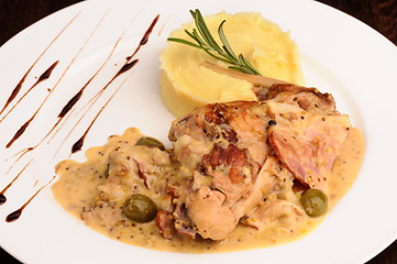 Image showing Rabbit legs with potato puree and rosemary