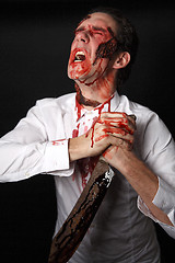 Image showing Psychopath with bloody knive