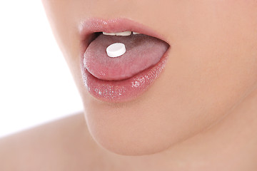 Image showing Woman takes pill