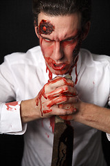 Image showing Psychopath with bloody knive