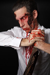 Image showing Psychopath with bloody knive