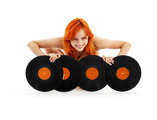 Image showing lovely redhead with vinyl records