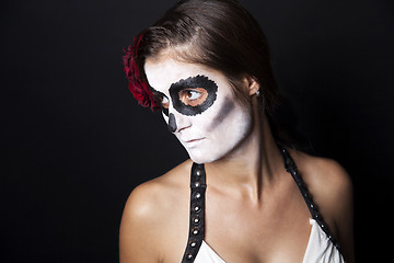 Image showing Woman with makeup of la Santa Muerte with red rose