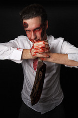 Image showing Psychopath with bloody knive