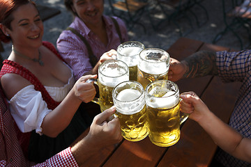 Image showing People drinking beer in a traditional Bavarian beer garden