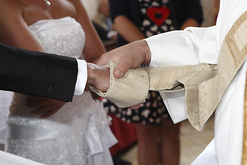 Image showing Hands of a bride and groom