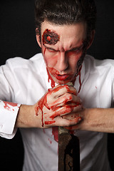 Image showing Psychopath with bloody knive