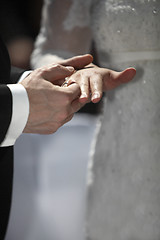 Image showing Hands of a bride and groom