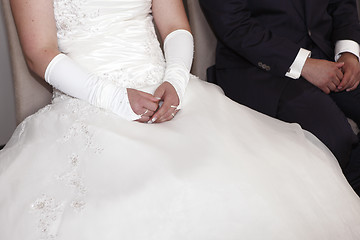 Image showing Hands of a bride and groom