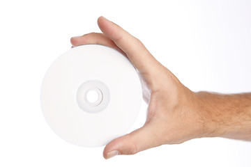 Image showing Man holds compakt disc