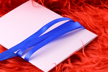 Image showing Greeting card with white paper and blue bow