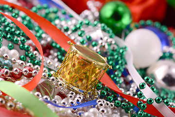 Image showing Christmas decorations, new year invitation card, drums, pearls and xmas balls