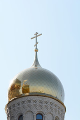 Image showing Golden cupola and christian cross on church against blue sky