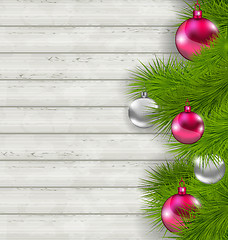 Image showing Christmas composition with glass hanging balls and fir twigs