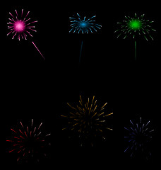 Image showing Set colorful fireworks on dark background