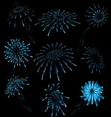 Image showing Set different fireworks on dark background