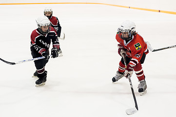 Image showing Game of children ice-hockey teams