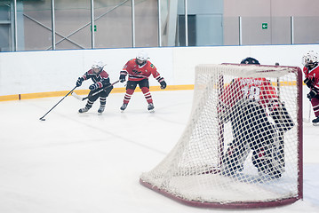 Image showing Game of children ice-hockey teams