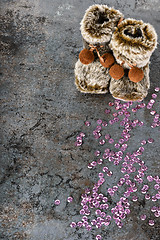 Image showing Christmas decorations - snow boots and sequins