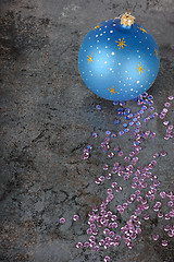 Image showing Christmas decorations - blue ball and sequins