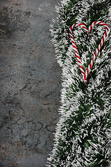 Image showing Christmas decorations - ball and spruce tinsel