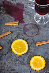 Image showing Spilled mulled wine and orange