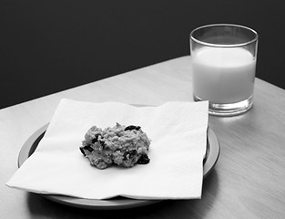 Image showing Fresh cookie served with a glass of milk