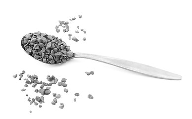 Image showing Teaspoon of instant coffee, some granules spilled 